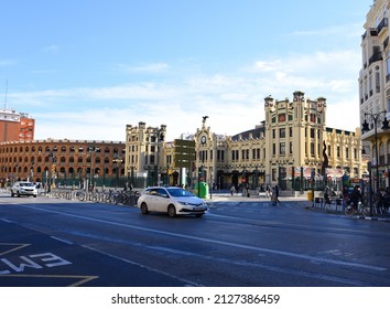 Valencian Central Train Station (Estació Del Nord). Facade Building Of North Railroad Station. Plaza De Toros. City Street, Cars Traffic, People And Buildings.  Dec 28, 2021, Spain, Valencia.