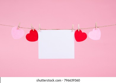 Valentine Card Mock Up On A Pink Background With Hearts