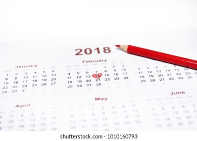 Valentine day abstract photo  Calendar and pencil isolated white background 
