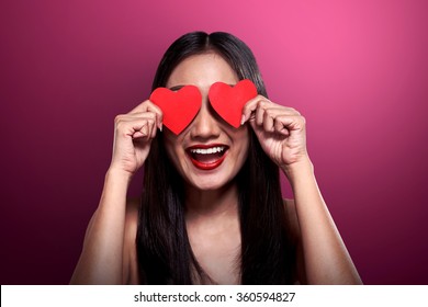 Valentine Day Concept. Beautiful Asian Girl Holding Red Heart Cover Her Eyes.