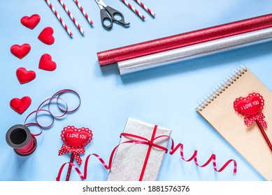 Valentine Day Gift Wrapping Supplies On Blue Background With Copy Space