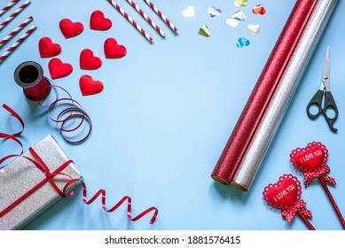 Valentine Day Gift Wrapping Supplies On Blue Background With Copy Space