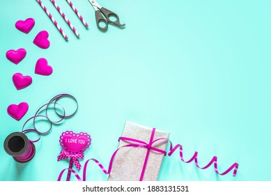 Valentine Day Gift Wrapping Supplies On Blue Background With Copy Space