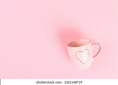 Valentine Day Layout. Mug With Hearts On A Pink Pastel Background. St. Valentines Day, Day Love, February 14 Concept. Copy Space, Top View, Flat Lay Composition