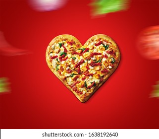 Valentine Day pizza or restaurant concept. love shape pizza isolated on red background concept of valentine day. love food- pizza day - Powered by Shutterstock