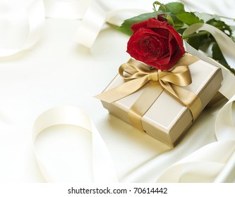 Valentine gift over white silk - Powered by Shutterstock