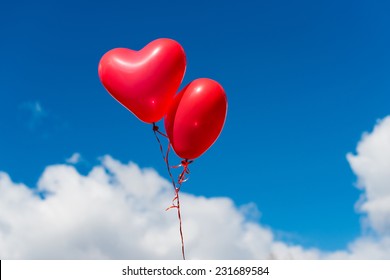 Valentine Heart Balloon Against Blue Sky Background