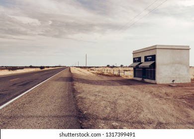 Valentine, TX/USA - December 18, 2006: The Prada Marfa store sits alone at dawn in the middle of the desert