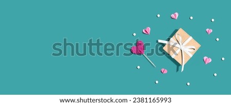 Valentines day or Appreciation theme with a gift box and paper craft hearts