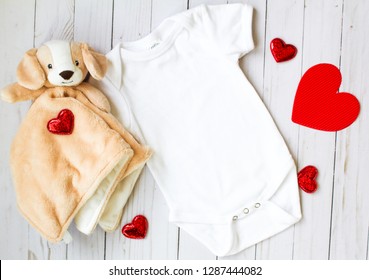 Valentine's Day Baby Onesie Mockup With Hearts And Stuffed Doggy