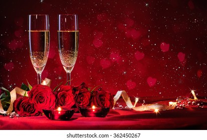 Valentines Day Background With Champagne Glasses And Red Roses