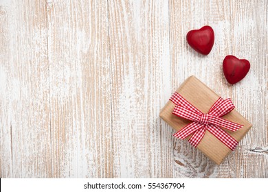 Valentine's day background with gift box and hearts - Powered by Shutterstock