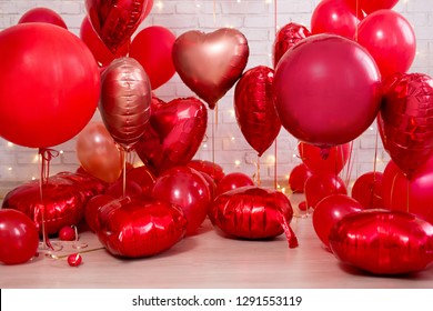 Valentine's day background - group of red circle and heart shaped balloons
