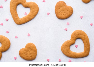 Valentine's Day Background With Heart Shaped Cookies And Pink Candy Hearts. Overhead Shot With Free Space For Text.