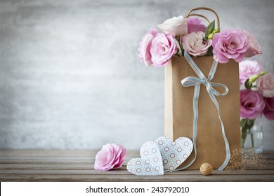 Valentines Day Background With Pink Roses, Bow And Paper Hearts