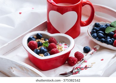 Valentines Day Breakfast In Bed / Breakfast In Bed With Muesli Bowl Berries And Milk, Selective Focus