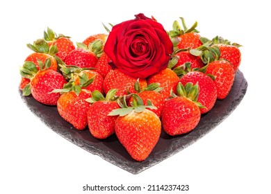 Valentines day breakfast. Heart shaped platter of strawberries with red rose. Romantic gesture of love. Stawberry meal isolated on white background.