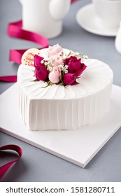 Valentines Day Cake With Cream Topped With Fresh Roses