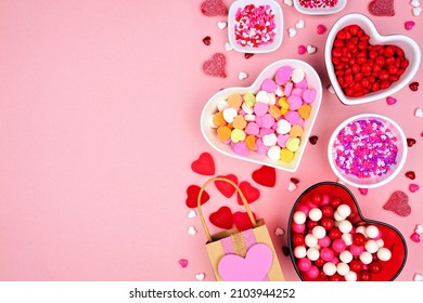 Valentines Day Candy Side Border With Assorted Sweets. Overhead View On A Pink Paper Background With Copy Space.