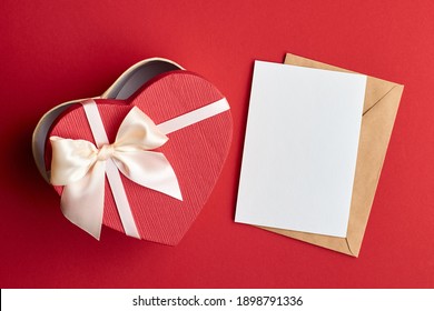 Valentines Day Card Mockup With Envelope And Heart Gift Box On Red Paper Background