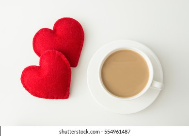 Valentine's Day Card. White Mug Of Hot Coffee With Milk And Red Felt Heart. Top View.