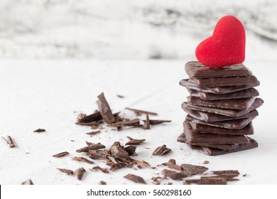 Valentines Day Chocolate Sweets And Red Velvet Heart On White Background Copy Space