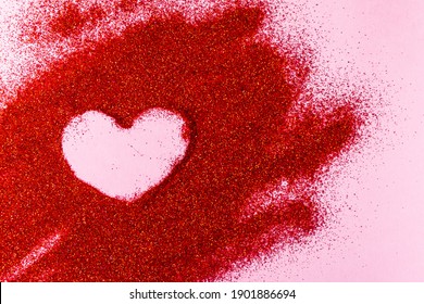 Valentine's Day concept. Heart shaped painted by on red glitter. - Powered by Shutterstock