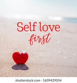 Valentines Day Concept. Romantic Love Symbol Of Red Heart On The Sand Beach With Copy Space And Text Message. Inspirational Quote Postcard. Self Discovery, Self Growth, Personal Development Concept