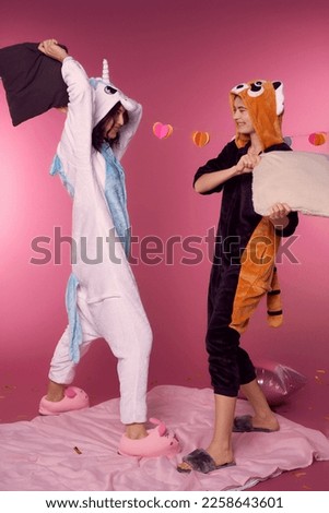 Similar – loving couple in the Park wearing pajamas