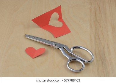 Valentine's Day Crafting Project Hearts With Scissors And Red Construction Paper