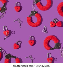 Valentines day creative pattern with red furry handcuffs, heart shaped bright red padlocks and keys on bold purple background. 80s or 90s retro fashion aesthetic love concept. Minimal romantic idea.