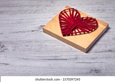 Valentine's Day Crooked String Art Red Heart With Space For Greetings Photo Taken From Below.  This File Is Cleaned And Retouched.