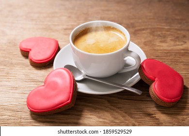 Valentines Day.  Cup Of Coffee And Colorful Heart Shaped Cookies On A Wooden Table