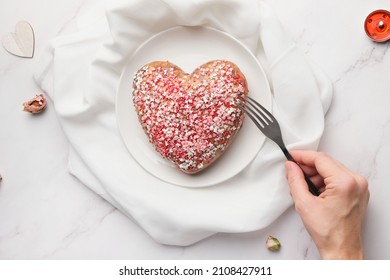 Valentines Day food, happy singles concept. Woman eating heart shaped cake. Table top view. Single young woman celebrating Valentine's Day. - Shutterstock ID 2108427911