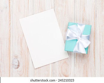 Valentines Day Gift Box And Greeting Card On White Wooden Table With Copy Space