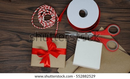 Similar – Foto Bild Weiße Geschenkbox mit Aufkleber auf Holztisch.