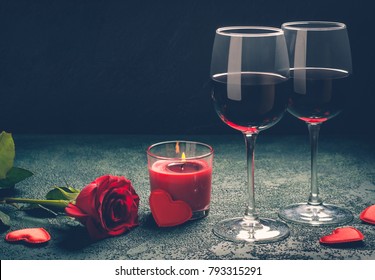 Valentines Day Greeting Card Concept. Wine Glasses, Rose And Candle 