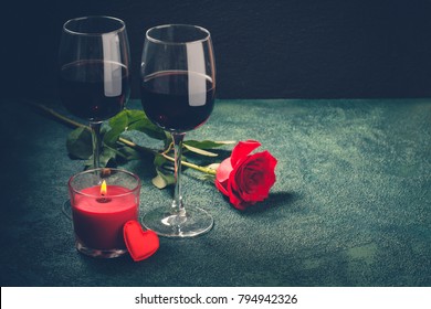 Valentines Day Greeting Card Concept. Wine Glasses, Rose And Candle 