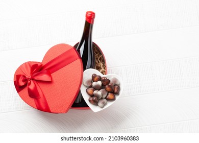 Valentines Day Heart Gift Box With Wine And Chocolate. Top View Flat Lay With Copy Space