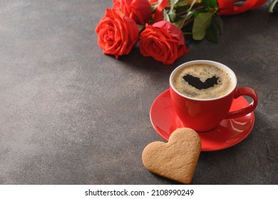 Valentine's day heart shaped cookie, black coffee and red roses. Close up. Romantic breakfast. - Shutterstock ID 2108990249