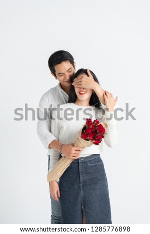 valentines day, love and people concept - happy couple with red heart shaped balloons, Roses, Big Red heart Paper over white background