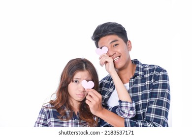 Valentines Day And Love. Romantic Feelings Concept. Man And Woman Couple In Love Hold Heart Card On White Background
