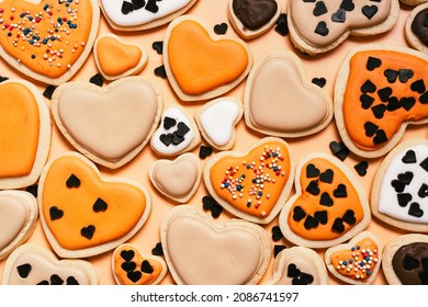 Valentines Day Or Mothers Day Sugar Cookies With Icing. Calm Coral Background. Top View