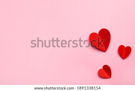 Valentine's Day pink background with red hearts shape. Copy space, space for text. Mockup template for design.