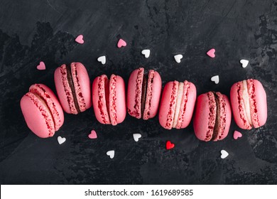 Valentines Day Pink Cake Macarons On Dark Stone Background