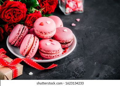 Valentines Day Pink Cake Macarons With Red Roses, Present Box And Red Hearts