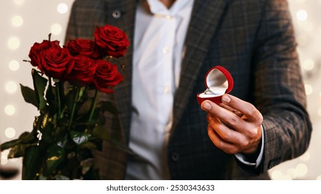 Valentine's Day Proposal. Romantic Man With Engagement Ring And Roses Flowers Asking Girlfriend To Marry Him - Powered by Shutterstock