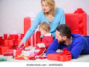 Valentines Day. Red Boxes. Happy Family With Present Box. Father, Mother And Doughter Child. Shopping. Boxing Day. Love And Trust In Family. Bearded Man And Woman With Little Girl. Happy Birthday.