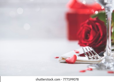 Valentine's Day Or Romantic Dinner Concept. Valentine Day Or Proposal Background. Close Up View Of Restaurant Table With Romantic Table Place Setting. Copy Space 