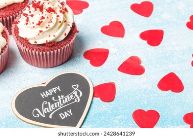 Valentine's day sweets. Red velvet cupcakes. Tasty cupcake with hearts. Festive background - Powered by Shutterstock